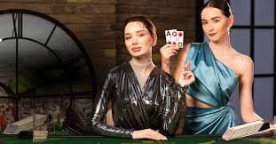 Live dealer studio with blackjack table and multiple camera angles